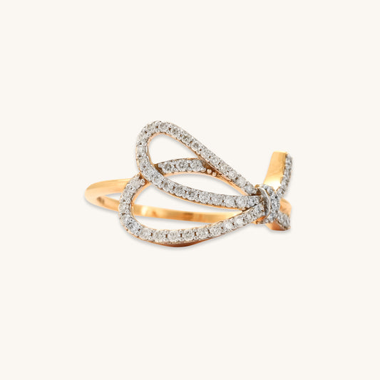Caratly 18kt gold Bow Diamond Ring featuring an open, asymmetrical ribbon or bow shape fully outlined in pave diamonds