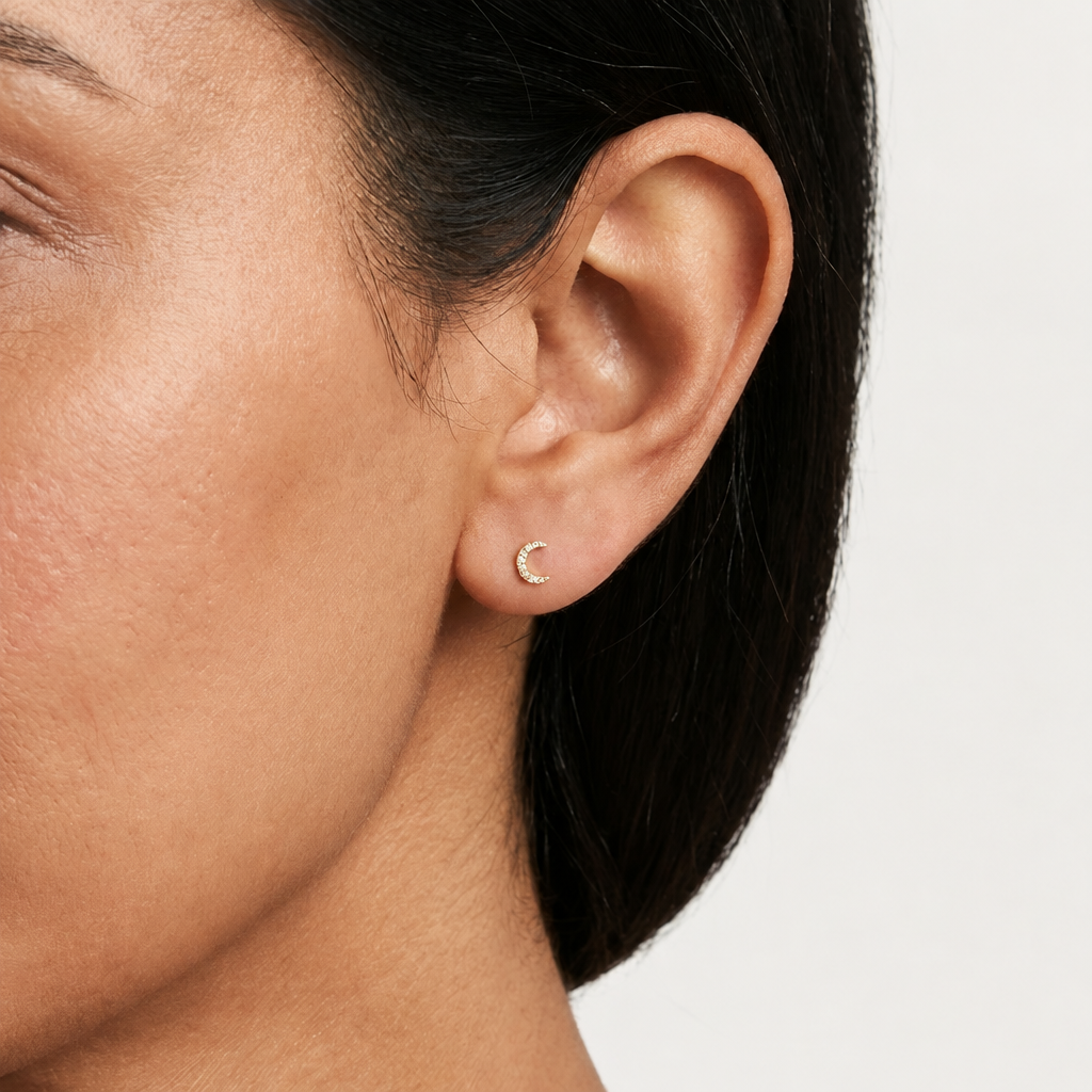 Gold crescent moon stud earrings fully paved with sparkling diamonds priced under Rs. 30,000