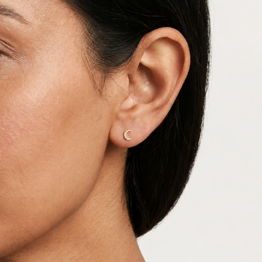 Gold crescent moon stud earrings fully paved with sparkling diamonds priced under Rs. 30,000