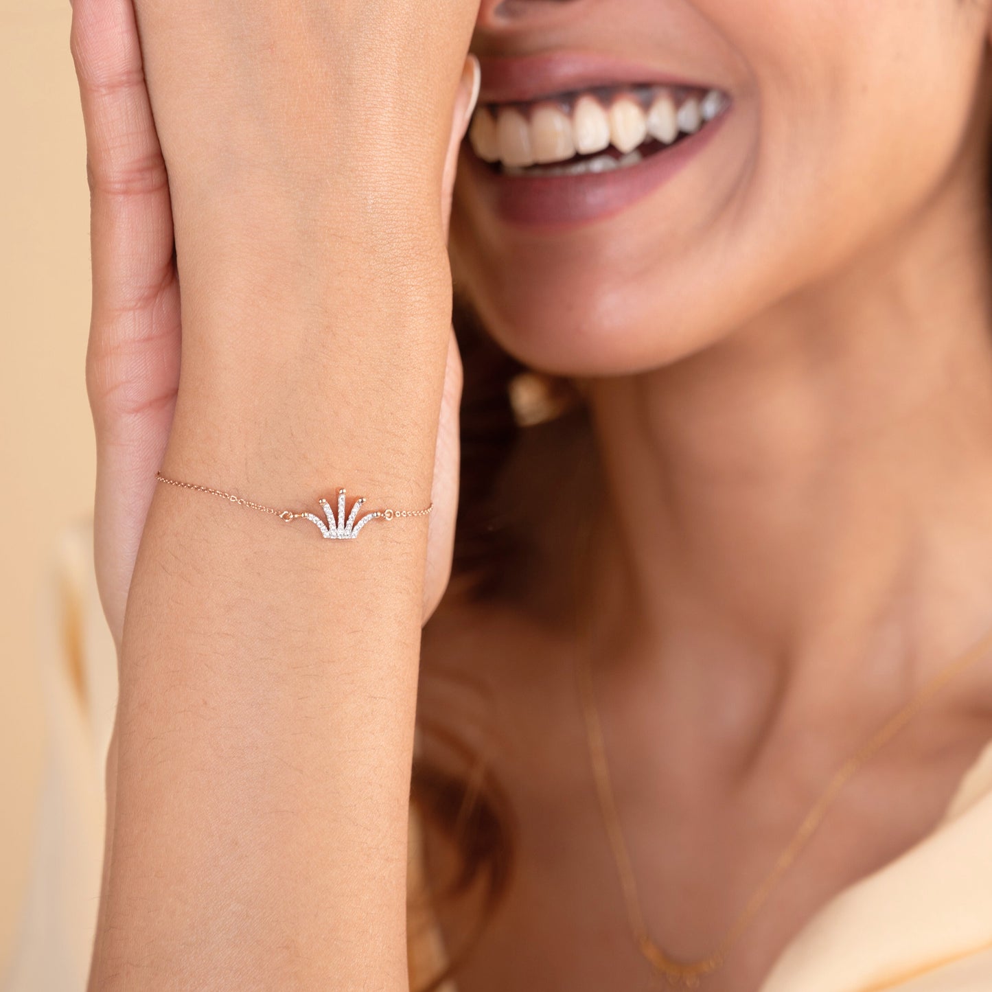 Caratly 18kt gold Diamond Crown Bracelet featuring a multi-point curved tiara charm fully set with pave diamonds. Minimal gifts for her under Rs. 40,000