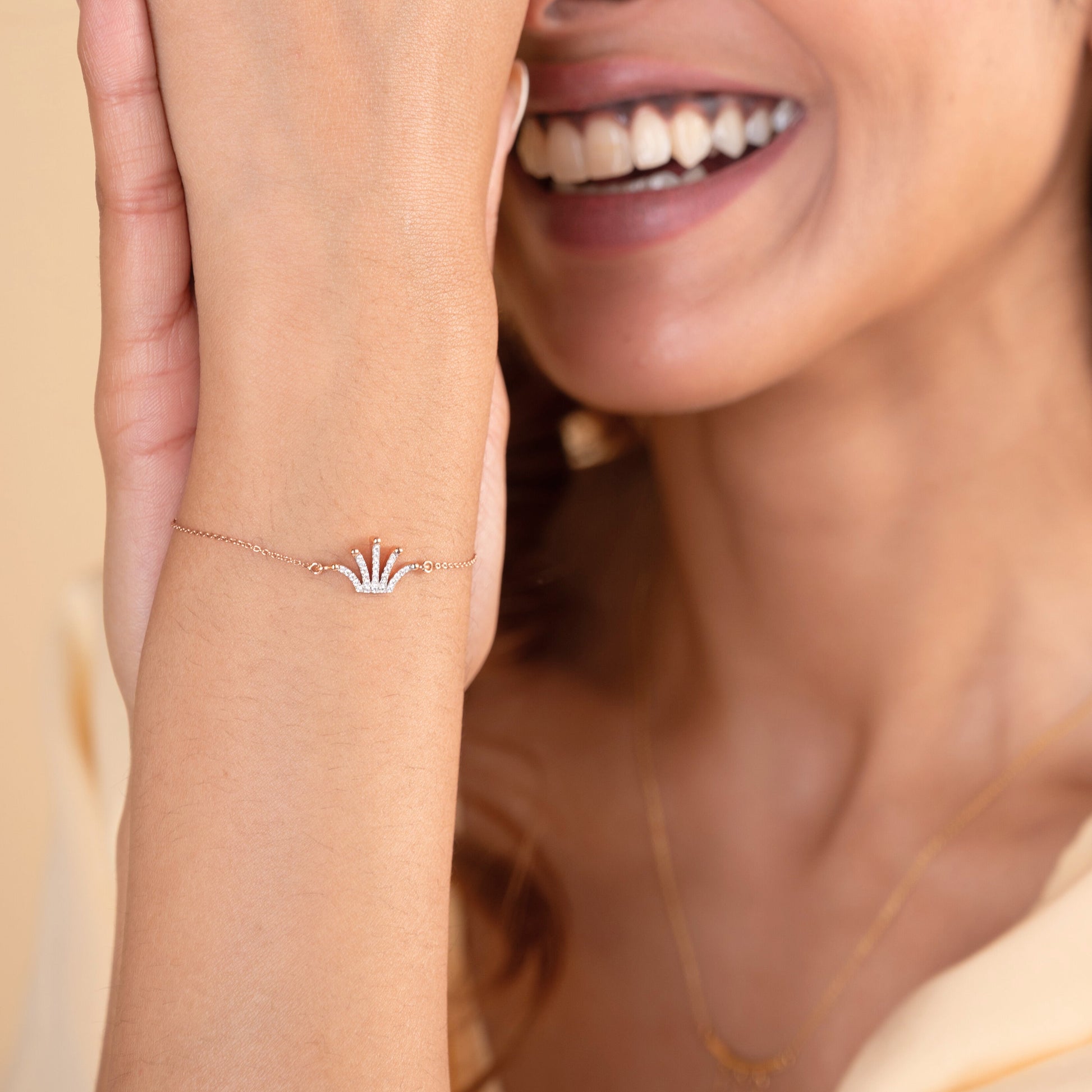 Caratly 18kt gold Diamond Crown Bracelet featuring a multi-point curved tiara charm fully set with pave diamonds. Minimal gifts for her under Rs. 40,000