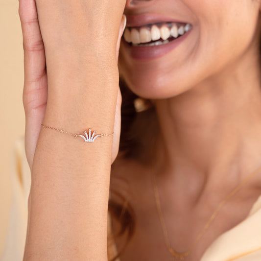 Caratly 18kt gold Diamond Crown Bracelet featuring a multi-point curved tiara charm fully set with pave diamonds. Minimal gifts for her under Rs. 40,000