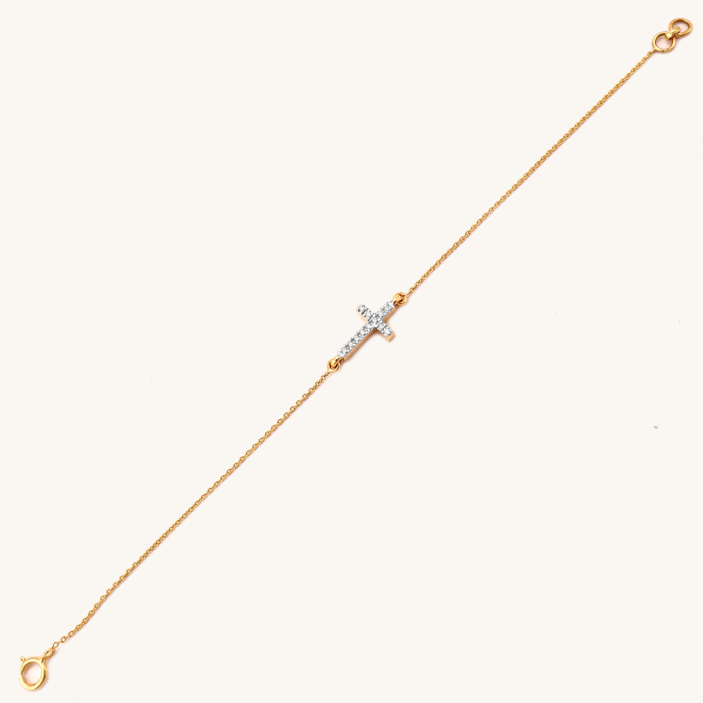 18kt gold Cross Diamond Bracelet featuring a delicate diamond-studded cross pendant centered on a fine gold chain under Rs. 40,000