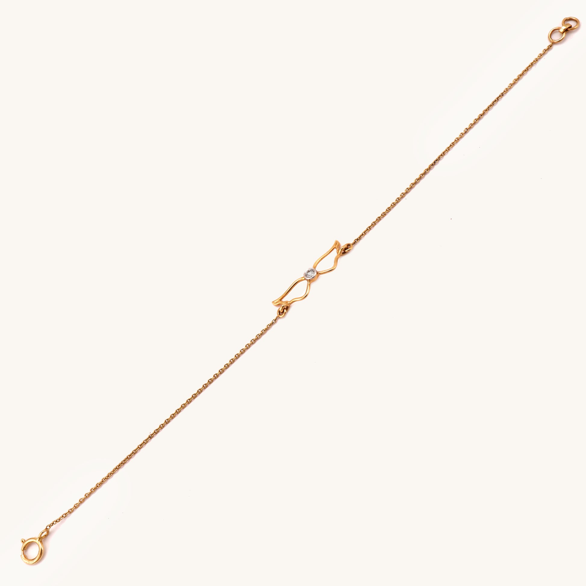 18kt gold Winged Diamond Bracelet with diamond. Accessible price range under Rs. 20,000