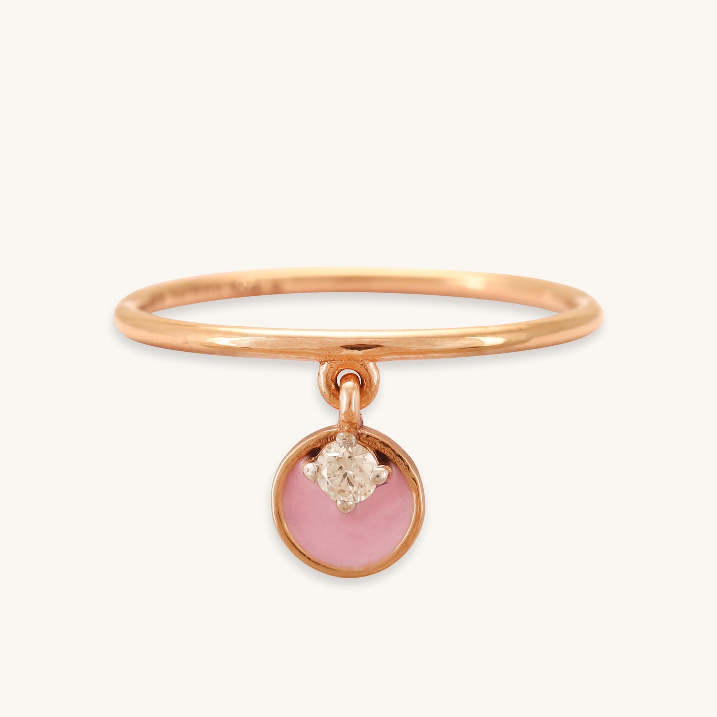 Caratly 18kt gold Pink Dangling Ring featuring a thin gold band and a swinging round pink enamel charm accented with a single diamond under Rs 25,000