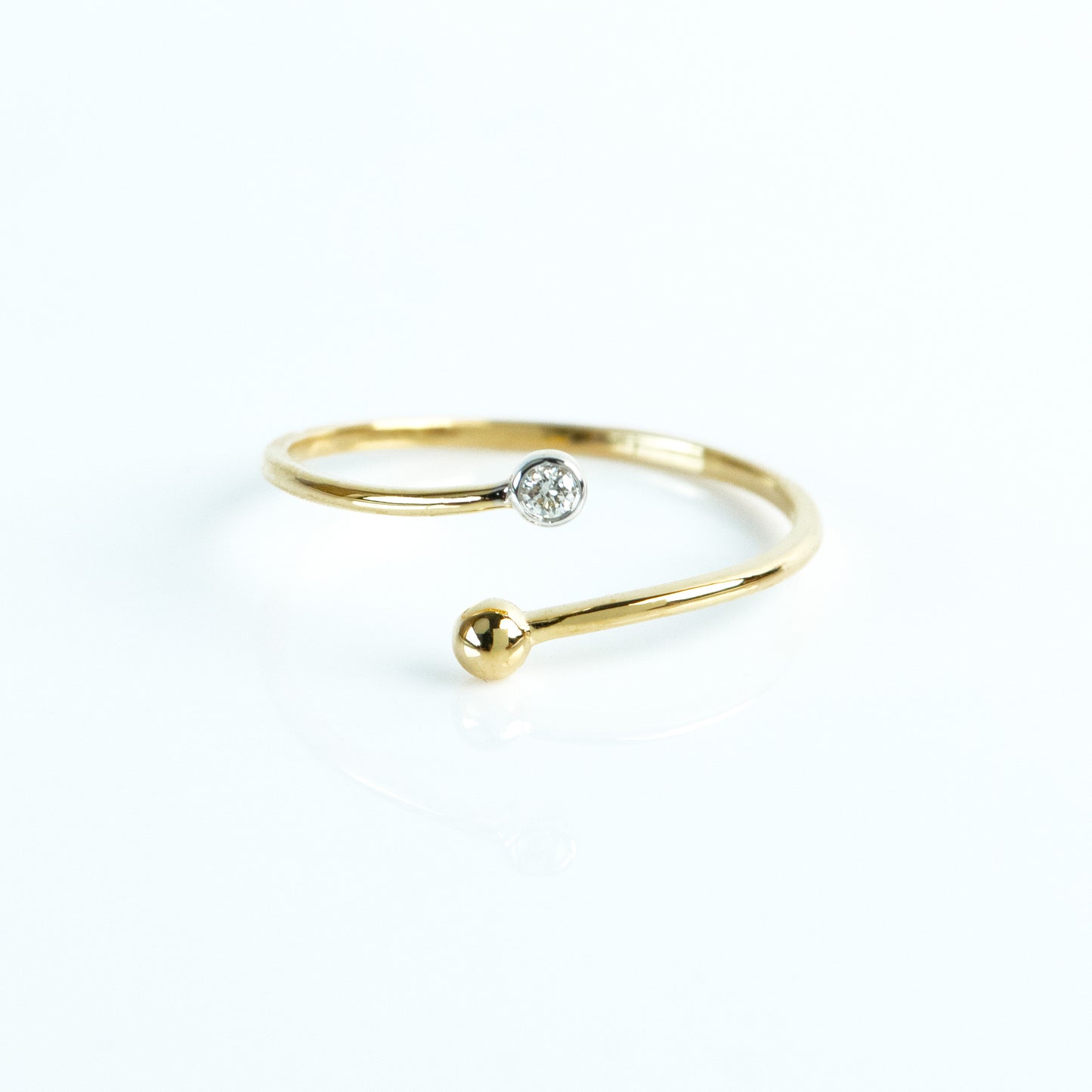 Caratly 18kt gold Crossover Diamond Ring with 0.03ct diamond and gold bead open bypass design under Rs. 15,000