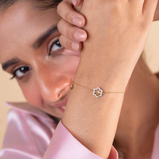 18kt gold Bloom Butterfly Bracelet with diamonds. Premium price range of Under Rs. 40,000