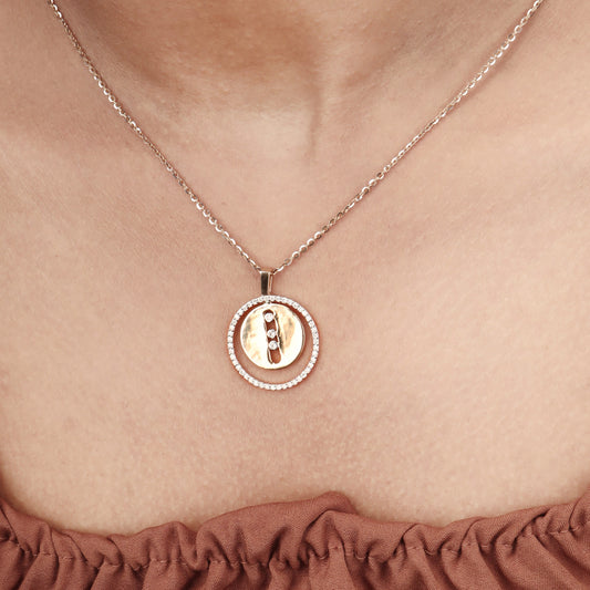 Caratly 18kt gold Double Circle Pendant featuring an outer circle of pave diamonds and a solid gold inner circle with a vertical row of three diamonds under Rs. 80,000