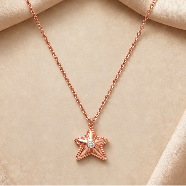 Rose gold starfish pendant necklace encrusted with sparkling stone priced under Rs. 70,000