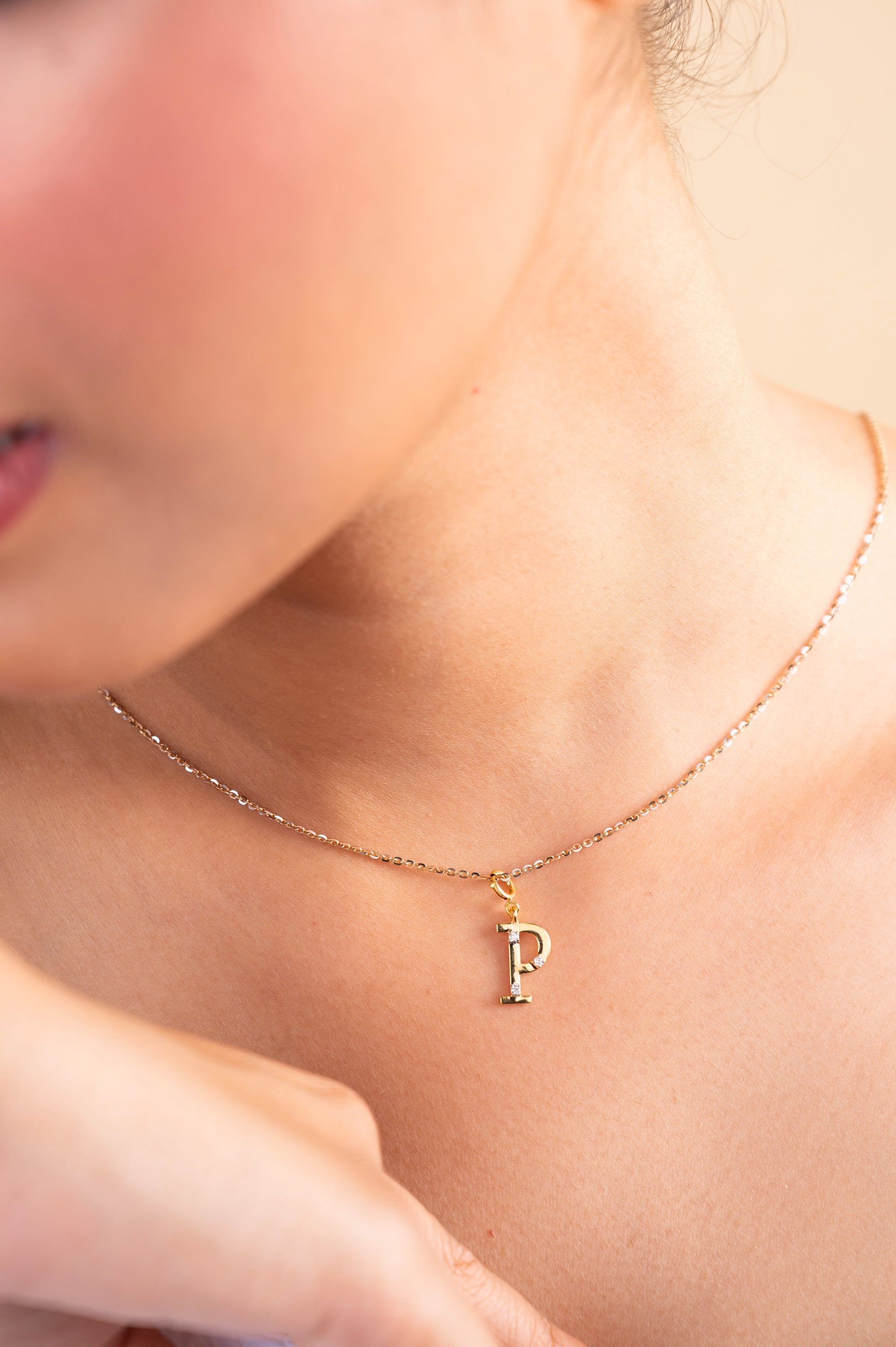 Enhance your everyday style with our delicate 18 kt gold P Diamond Pendant, adding a personal touch to your ensemble. Perfect for elevating your workwear edit, casual look, or everyday outfit, this pendant shines effortlessly. Explore our Under 30,000 collection now to find your perfect piece