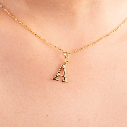 Make a personal statement with our 18kt 'A' Initial Diamond Pendant from the Spring Edit. Priced under 10,000, this elegant piece is a thoughtful gifting idea for your loved ones. Elevate their style with this exquisite jewelry—a cherished symbol of affection.