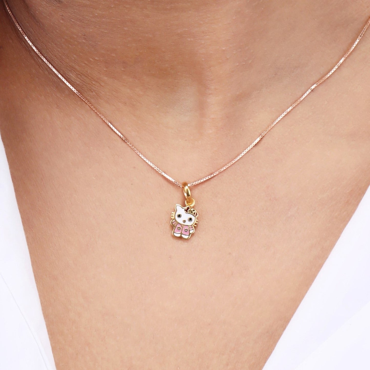 Caratly 22kt gold Kitty Gold Pendant featuring a small Hello Kitty inspired enamel cat charm on a delicate chain under Rs. 25,000
