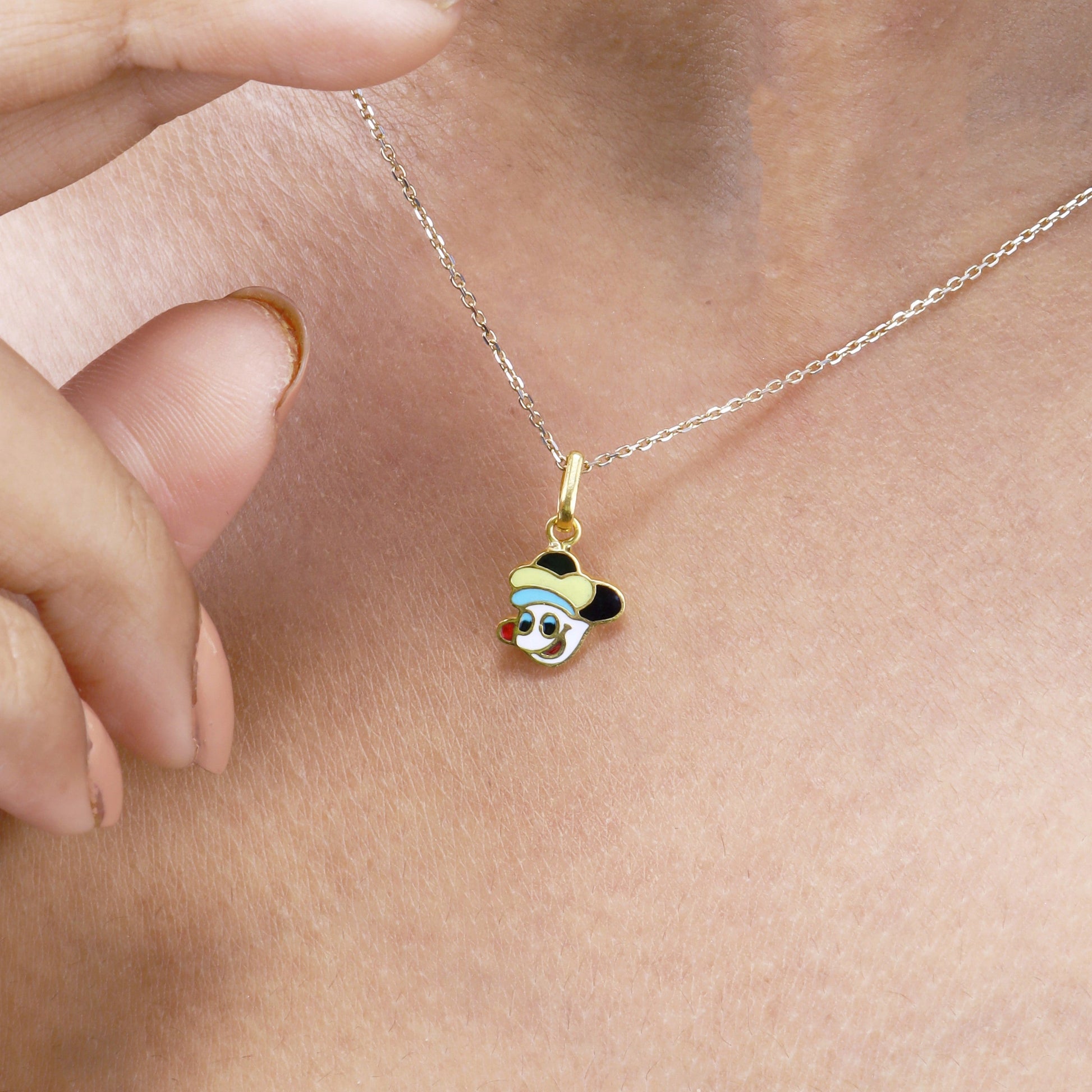 Caratly 22kt gold Mickey Mouse Pendant featuring a classic Mickey head shape with black enamel details on the face and ears. A cute gift for babies under Rs. 25,000