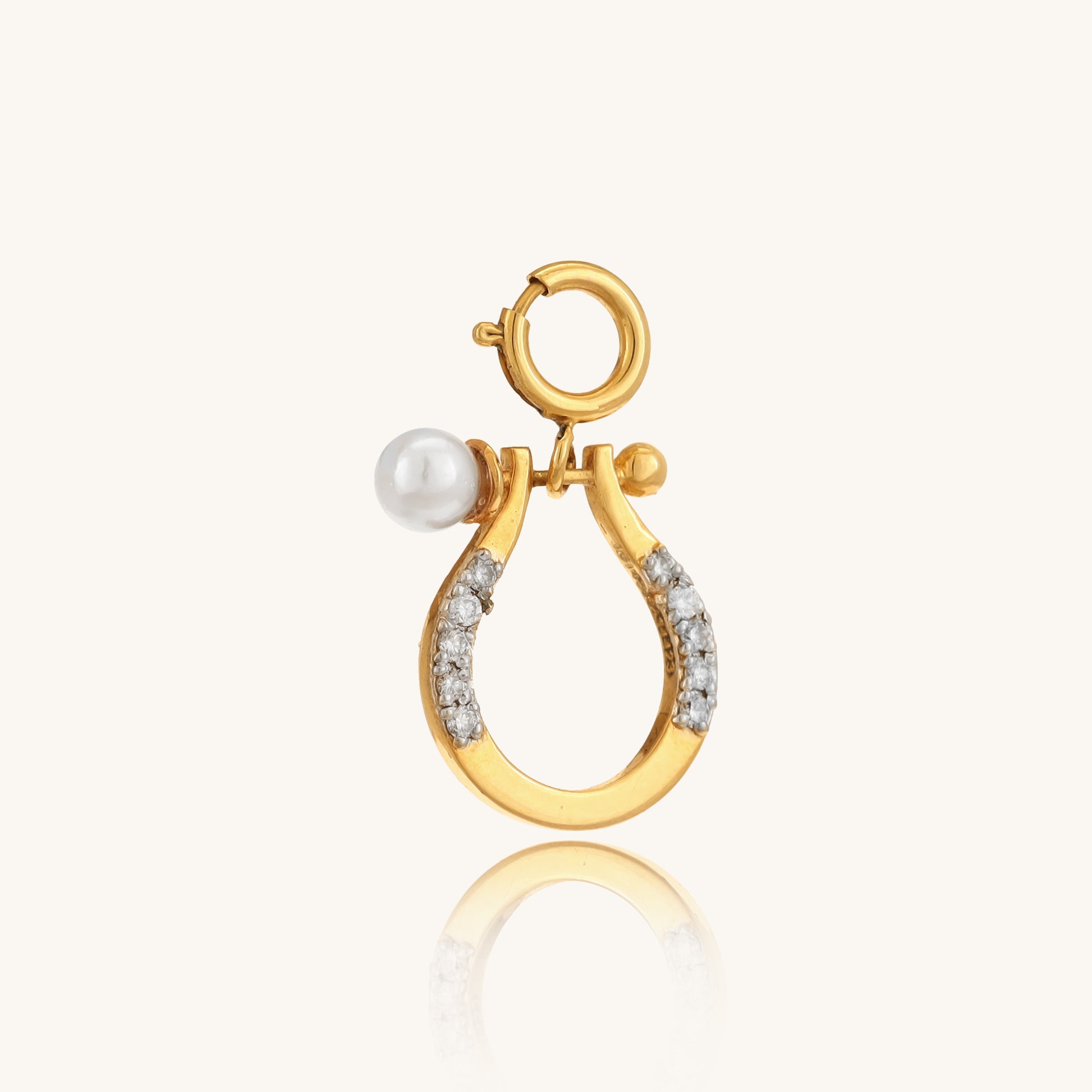 Caratly 18kt gold Horse shoe Pendant featuring a small lucky horseshoe motif with pave diamonds and a single pearl accent. Perfect gift for her under Rs. 20,000