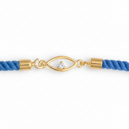 Blue rope men's bracelet with an 18kt gold evil eye charm and diamond accent. Minimal gift for him under Rs. 15,000