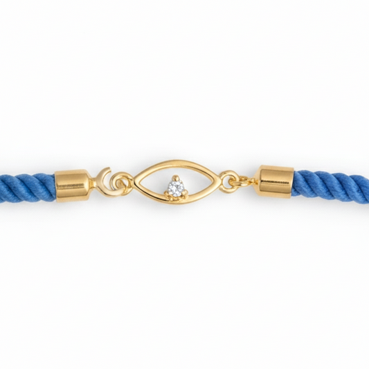 Blue rope men's bracelet with an 18kt gold evil eye charm and diamond accent. Minimal gift for him under Rs. 15,000