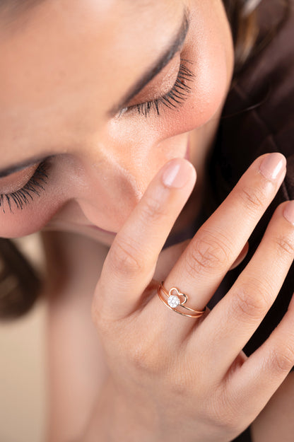 Elevate your everyday style with the Radiant Heart Ring, a stunning 18kt gold piece featuring a captivating heart-shaped diamond center. This versatile ring seamlessly transitions from work to weekend, adding elegance to any ensemble. Perfect for gifting or personal wear, it's a thoughtful addition to your jewellery collection under 30,000