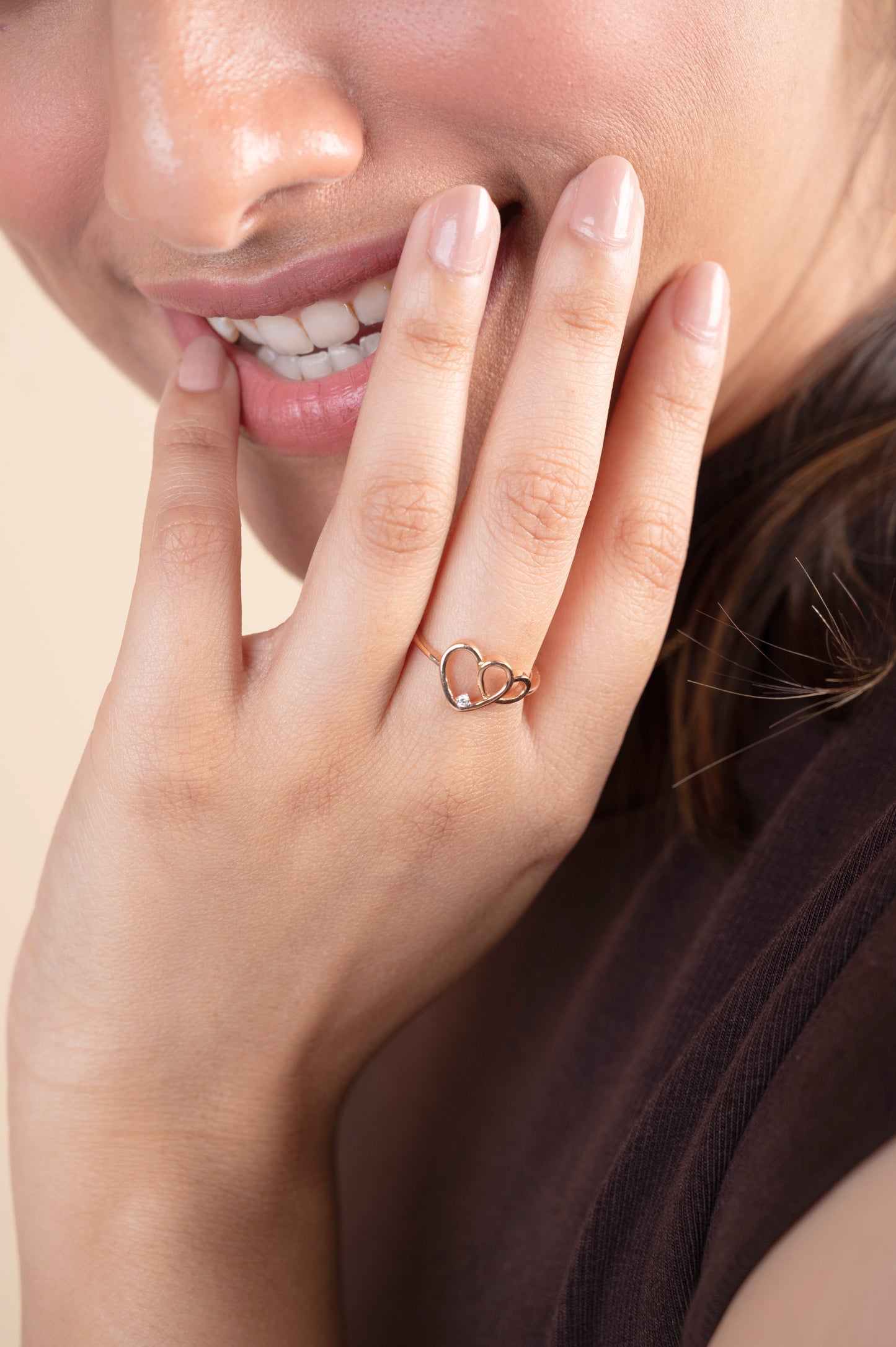 Elevate your everyday style with our delicate 18 kt gold Entwined Heart Ring, adorned with natural diamonds for Women. This charming diamond ring is perfect for casual, work, or everyday wear, adding a touch of love to your look. An ideal gift for her under 30,000, it's a timeless expression of affection. 