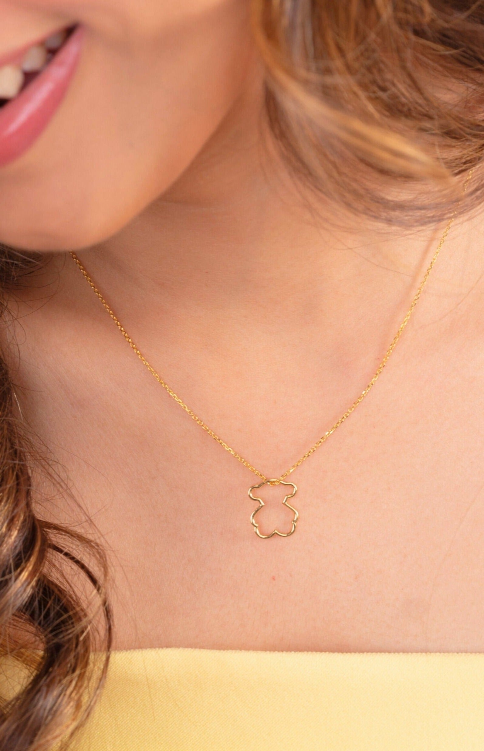 Enchant your little one with our adorable 18kt gold Teddy Bear Pendant! Versatile for both everyday wear and special occasions, this charming addition injects whimsical flair into their attire. Whether as a delightful gift or a cherished addition to their jewelry collection, it's bound to bring joy. Dive into our Under 10,000 collection now.