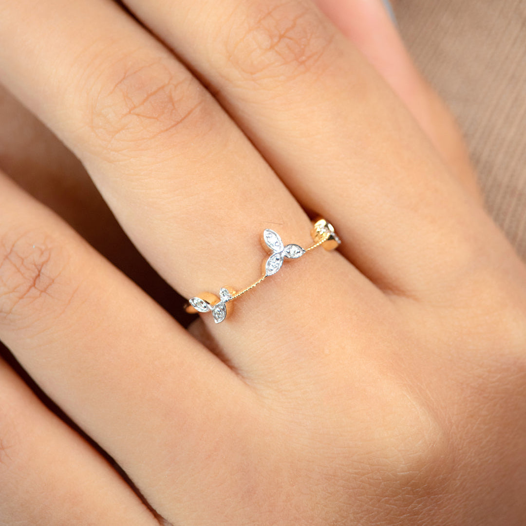 Caratly 18kt gold Entwined Flower Ring with three diamond floral clusters and textured vine band design, a minimal gift for her under 30,000