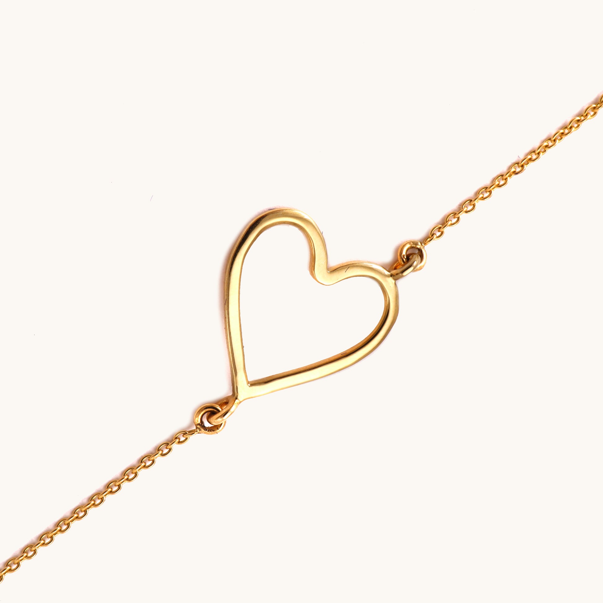 18kt gold open heart Forever Love Bracelet. Affordable gifts for her under Rs. 20,000