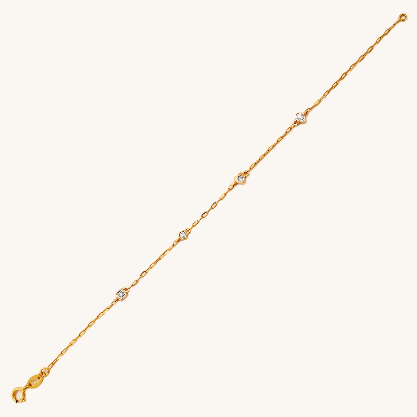 Caratly 18kt gold 4 Style Diamond Bracelet featuring a delicate chain with spaced diamond stations in various shapes including a heart and hexagon under Rs. 30,000