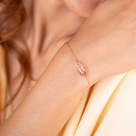 Caratly 18kt gold Quad Diamond Bracelet featuring an open elongated geometric hexagon shape with a straight horizontal bar of diamonds in the center under Rs. 30,000