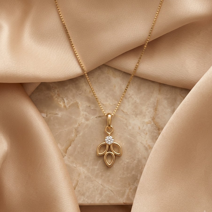 Gold open leaf-cluster pendant set with a sparkling diamond centre, priced under Rs. 20,000