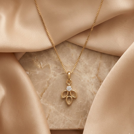 Gold open leaf-cluster pendant set with a sparkling diamond centre, priced under Rs. 20,000
