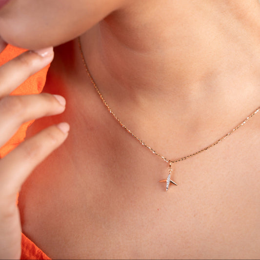 Caratly 18kt gold Traveller Diamond Charm airplane pendant design with 0.07ct diamonds wanderlust under 15,000