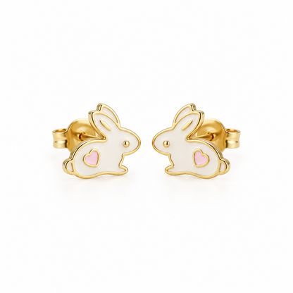 Gold bunny-shaped stud earrings with white enamel and a pink heart detail. A cute gold gift for kids under Rs. 20,000