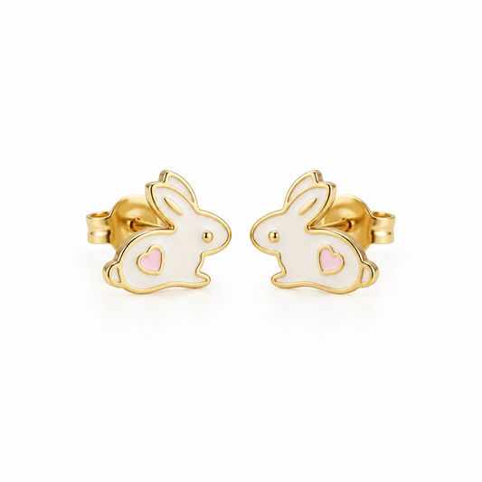 Gold bunny-shaped stud earrings with white enamel and a pink heart detail. A cute gold gift for kids under Rs. 20,000