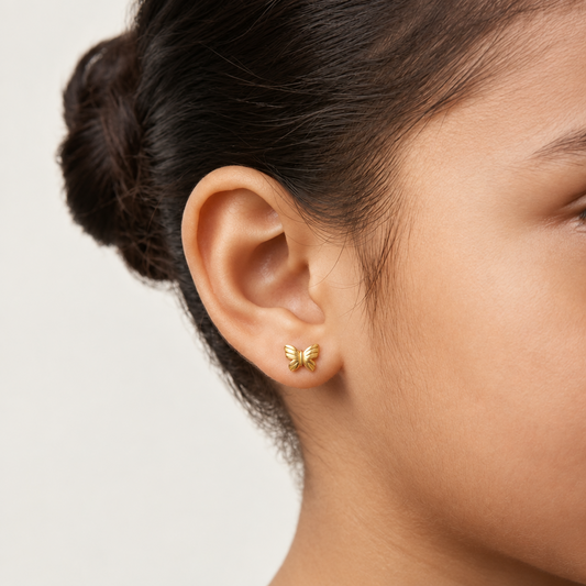 Pair of polished solid gold butterfly stud earrings. Cute gold gifts for kids under Rs, 25,000
