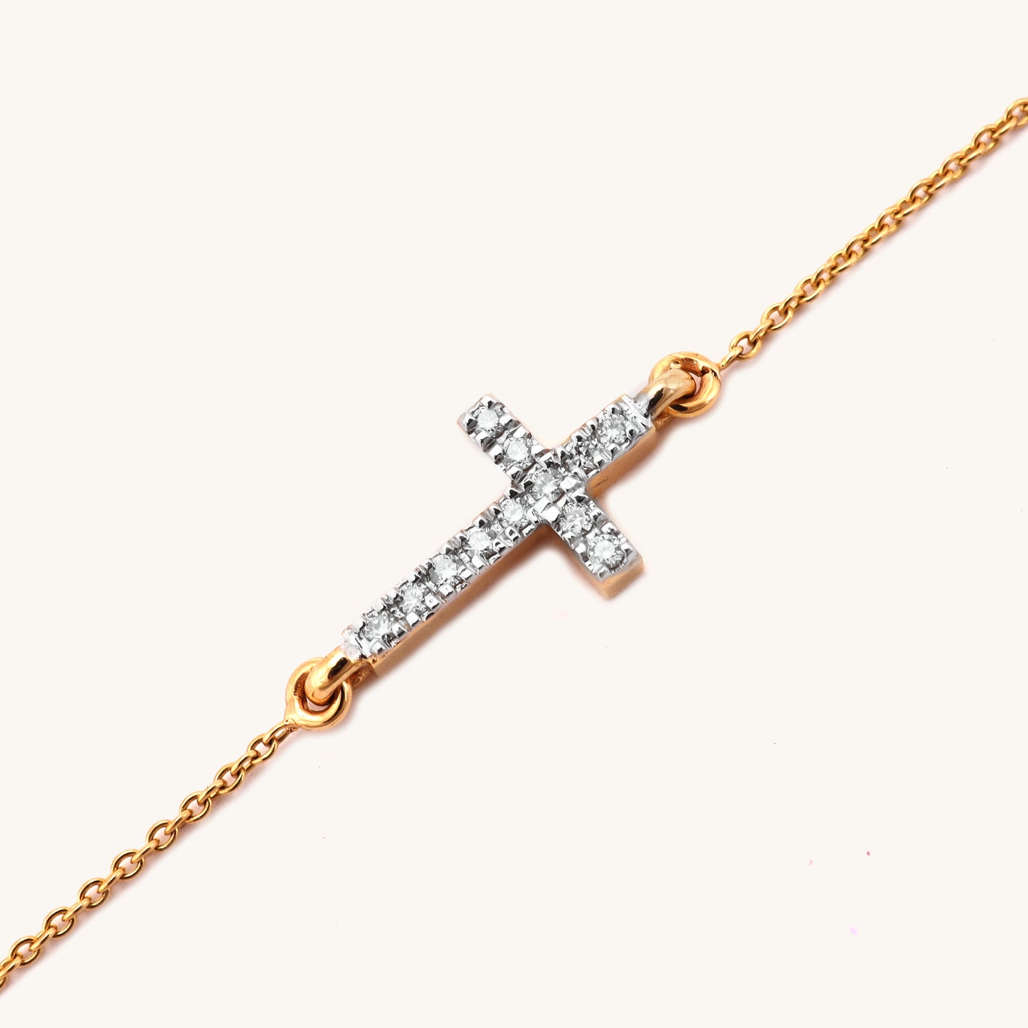 18kt gold Cross Diamond Bracelet featuring a delicate diamond-studded cross pendant centered on a fine gold chain under Rs. 40,000