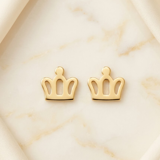 Polished gold crown-shaped stud earrings with an open cutout design. Perfect for gifting to kids under Rs. 20,000