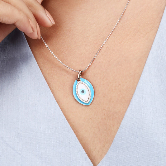 Caratly 18kt gold Evil Eye Pendant featuring a large turquoise enamel oval charm bordered and centered with pave diamonds under Rs. 40,000