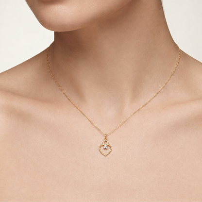 Gold textured heart-shaped pendant with a teardrop top and a diamond cluster accent priced under Rs. 20,000