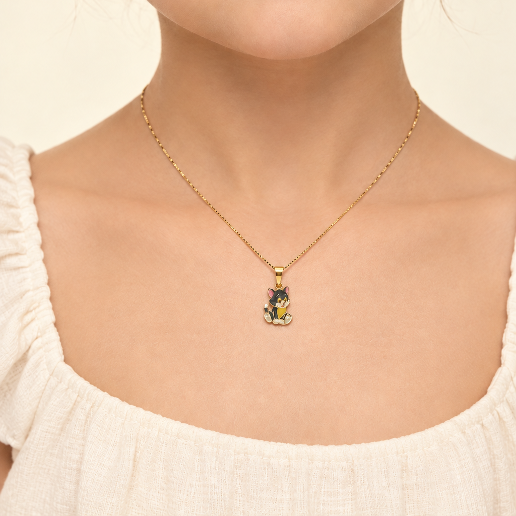 Gold enamel cat pendant with grey and orange detailing