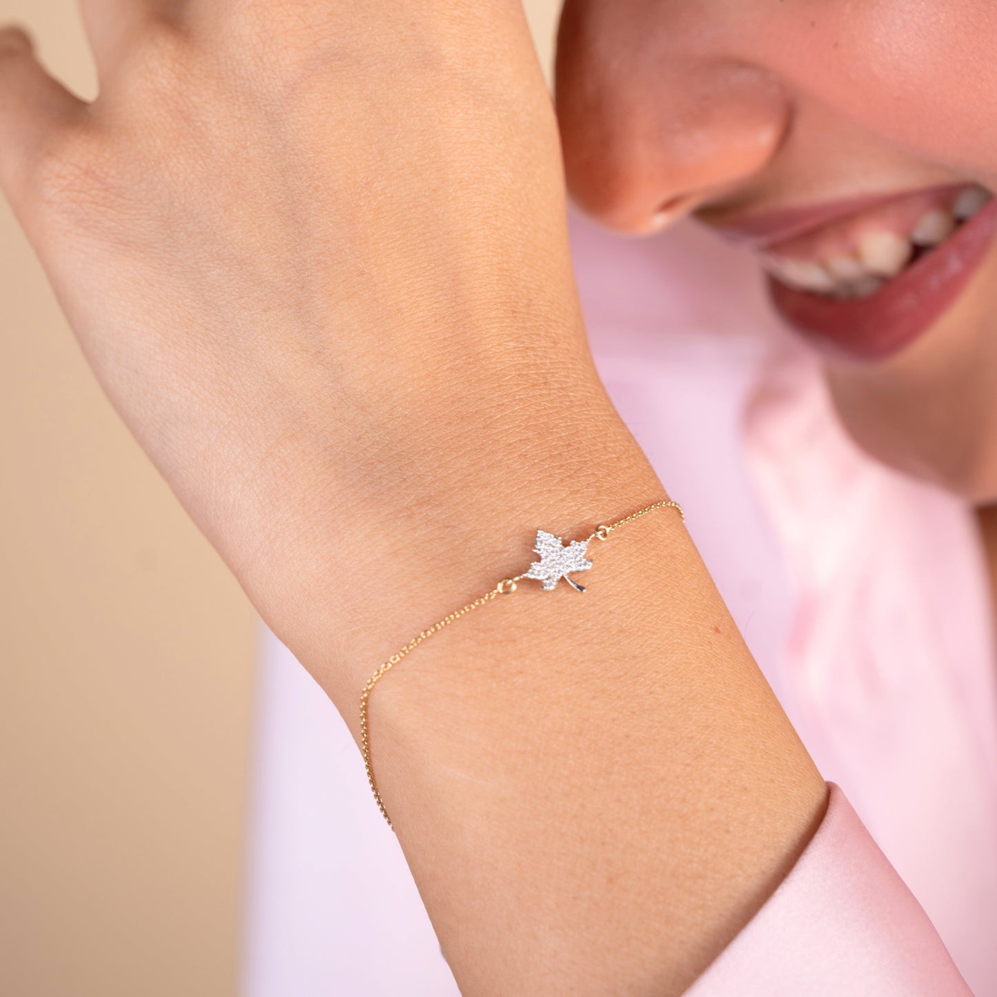 Caratly 18kt gold Maple Diamond Bracelet featuring a detailed maple leaf charm fully encrusted with pave diamonds. Minimal gift for her under Rs. 30,000