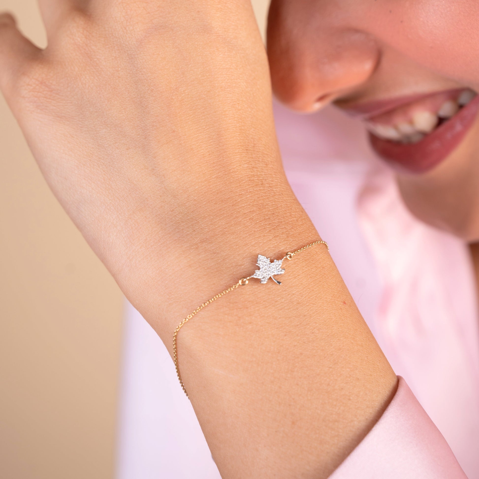 Caratly 18kt gold Maple Diamond Bracelet featuring a detailed maple leaf charm fully encrusted with pave diamonds. Minimal gift for her under Rs. 30,000