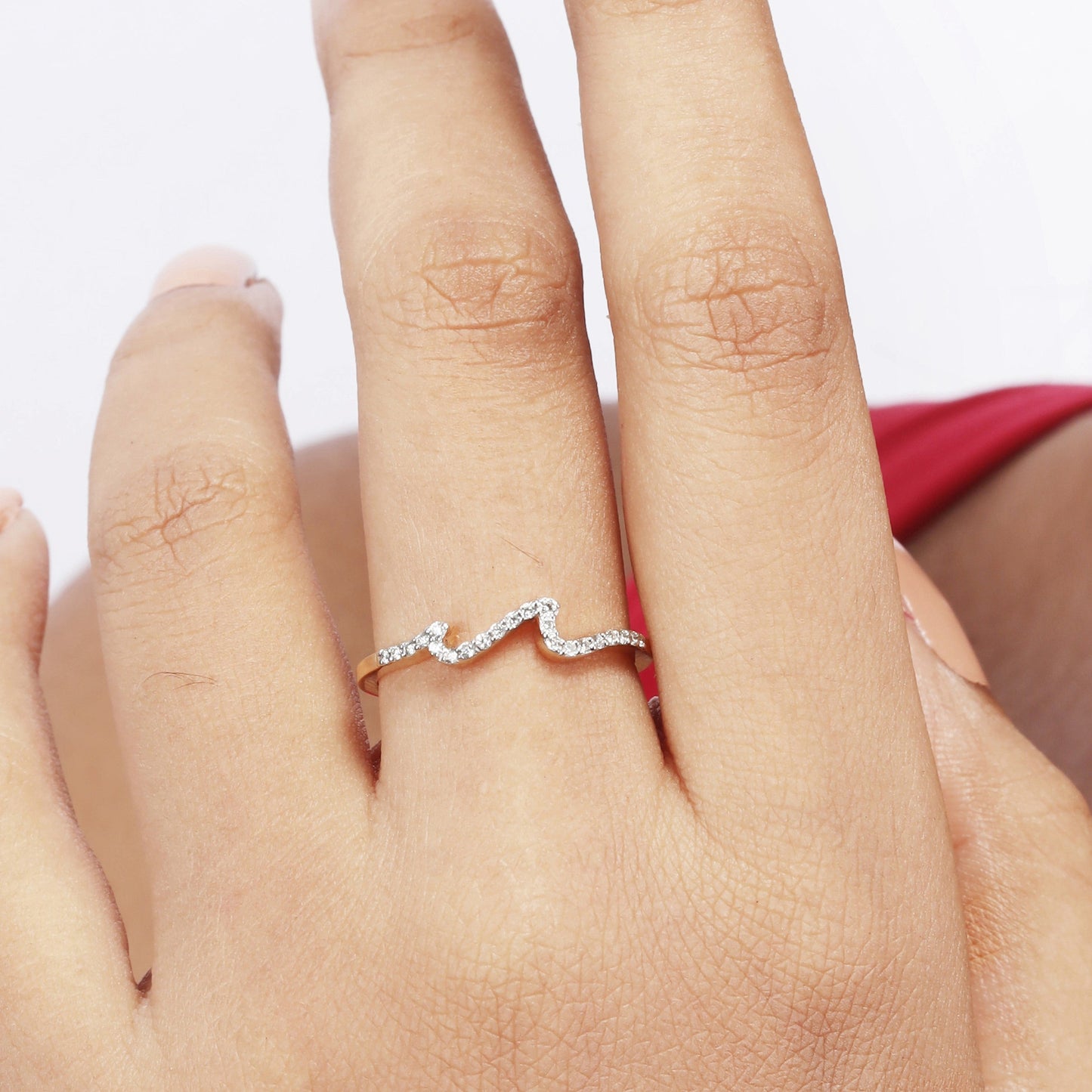 Caratly 18kt gold Wave Diamond Ring with 0.10ct diamond pave in a curved undulating wave band design under Rs. 30,000