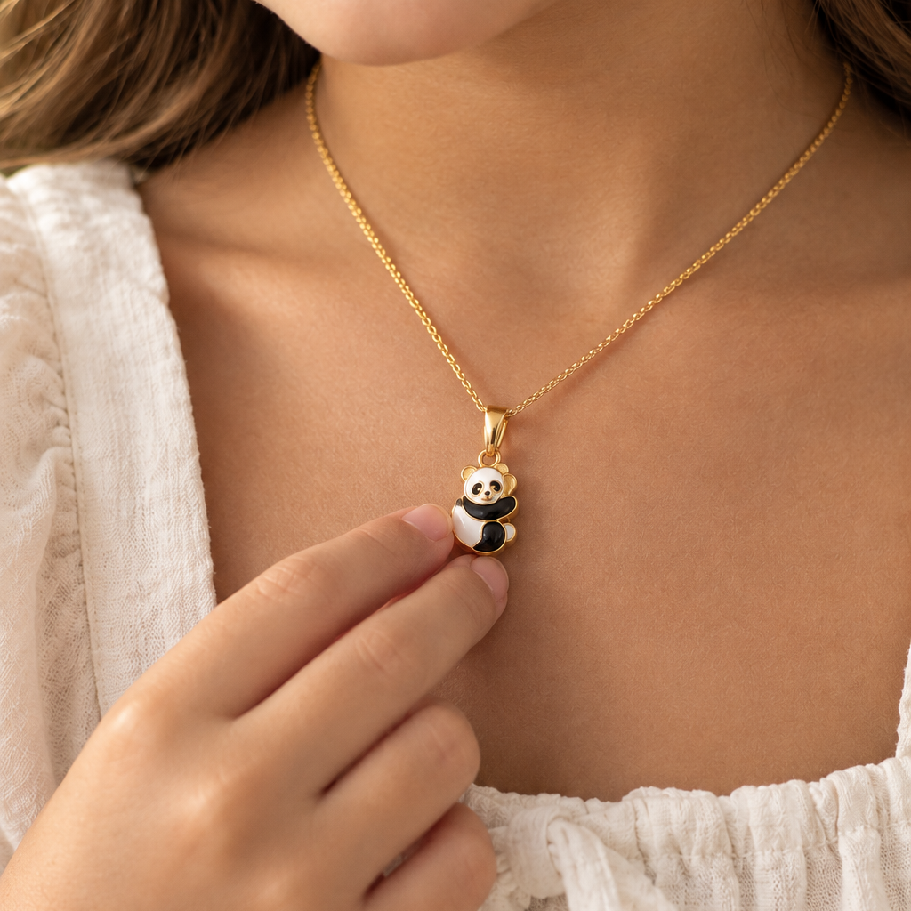 Gold panda charm pendant with black and white enamel detailing priced under Rs. 25,000