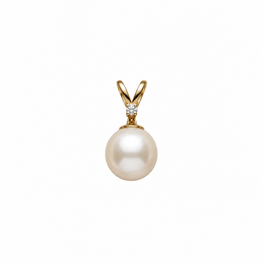 Gold V-bail pendant holding a large lustrous pearl beneath a sparkling diamond accent, priced under Rs. 20,000