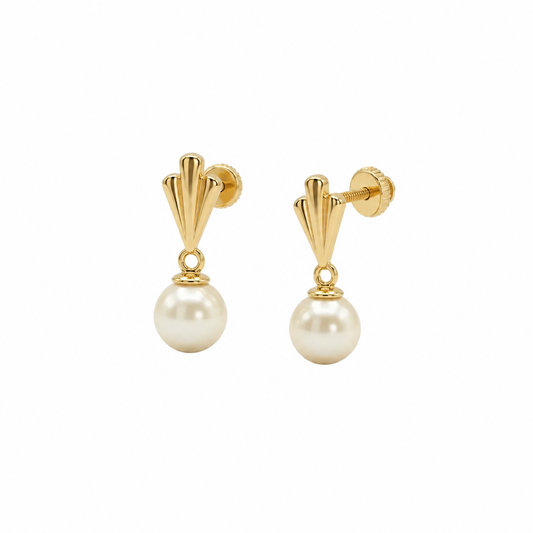 Gold drop earrings with a fluted cap and cream pearl. A perfect gift for her under Rs. 40,000
