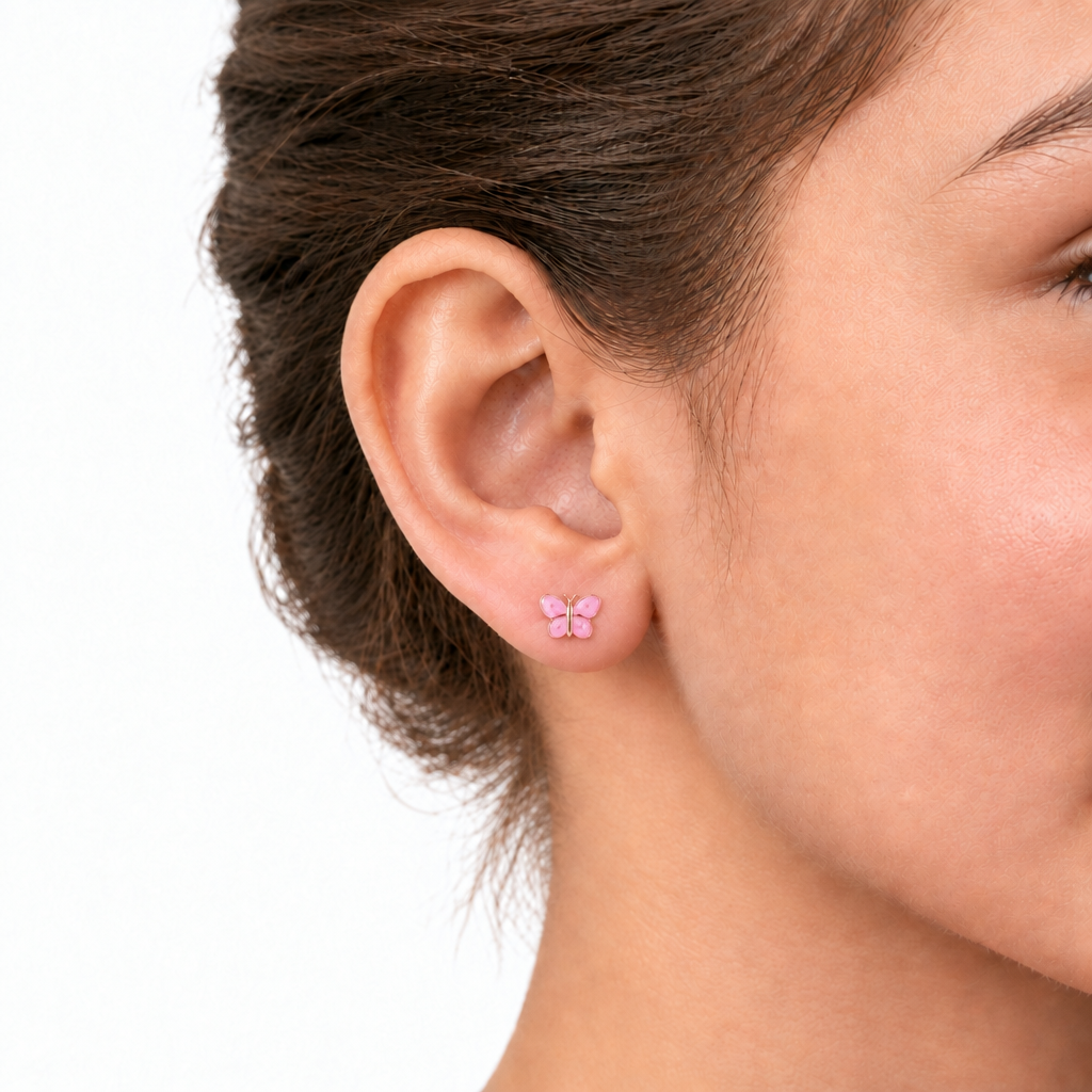 Pink enamel butterfly earrings with gold trim and antennae detail under Rs. 25,000