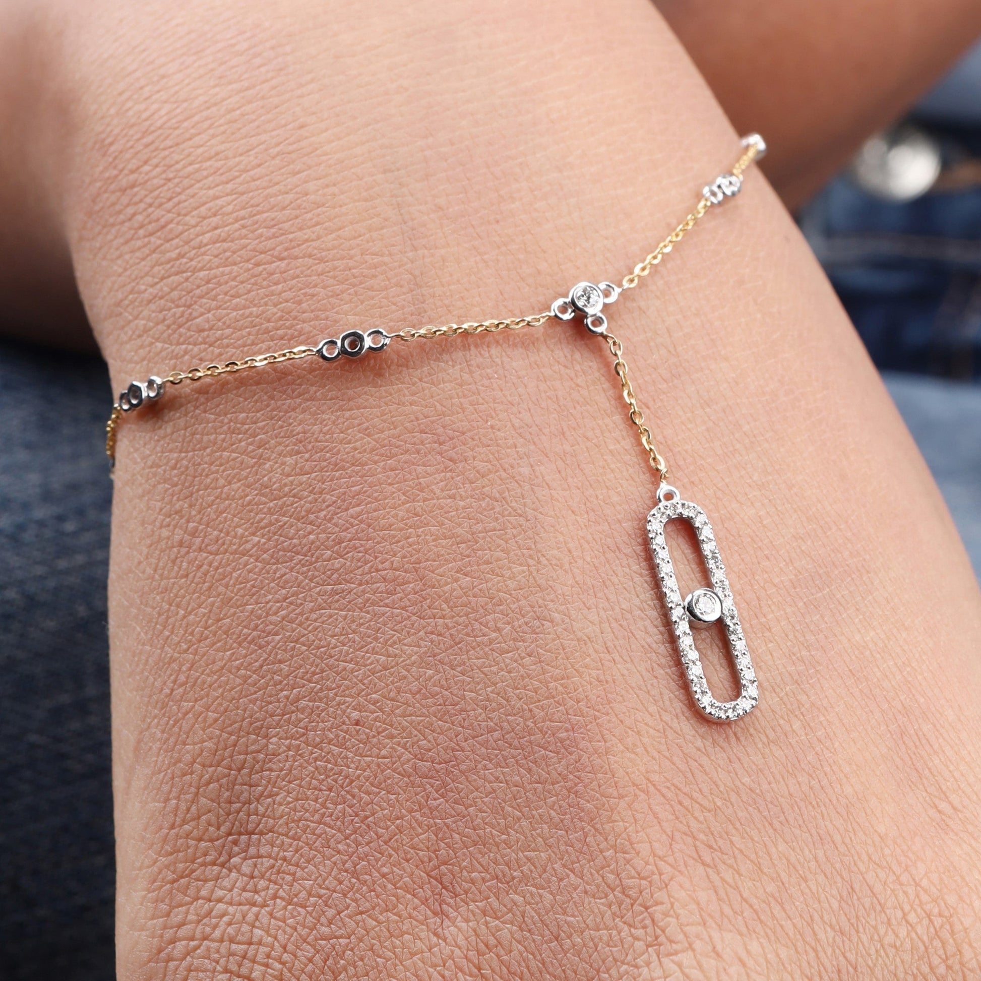 Caratly 18kt gold Belt Diamond Bracelet featuring a delicate chain with diamond stations and an elongated oval pave diamond dangling drop under Rs. 50,000