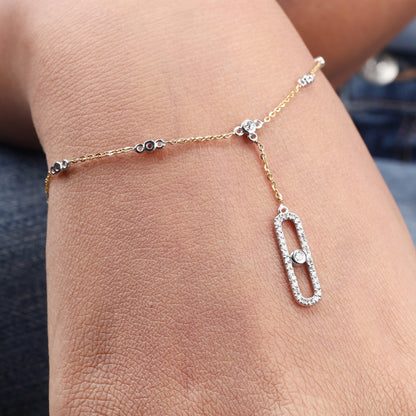 Caratly 18kt gold Belt Diamond Bracelet featuring a delicate chain with diamond stations and an elongated oval pave diamond dangling drop under Rs. 50,000