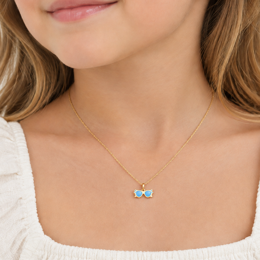 Gold sunglasses-shaped pendant with blue enamel lenses under Rs. 15,000