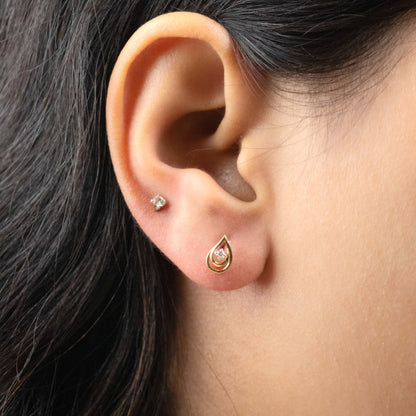 Caratly 18kt gold Droplet Diamond Earring with 0.04ct diamond accent in a stylized teardrop paisley stud design under Rs. 30,000