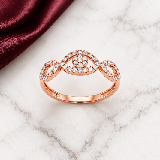 Rose gold infinity-style ring with a pave diamond evil eye motif. Luxe gifts for her under Rs. 50,000